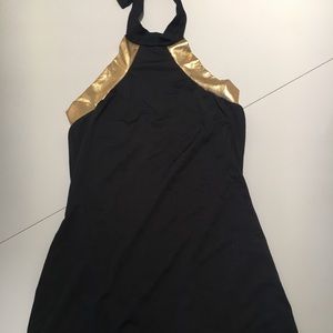 Long black with gold dress with tail.